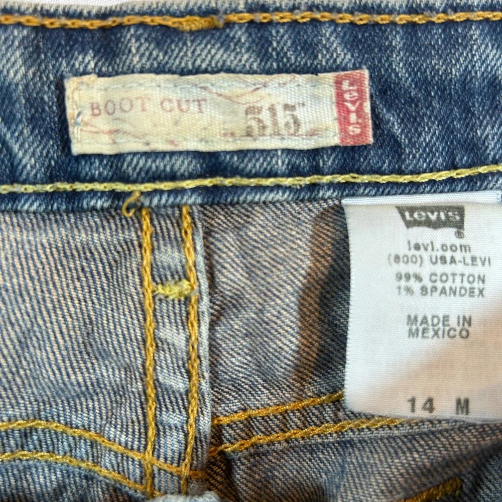 Levis 515 Boot Cut Jeans Mens 36x31 Blue Medium Wash Distressed Hem Denim